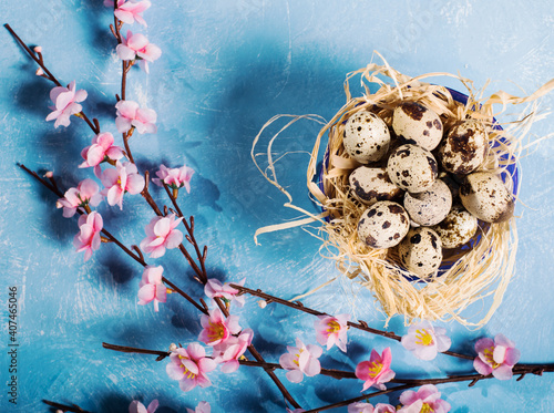 quail eggs inside nest in a easter background