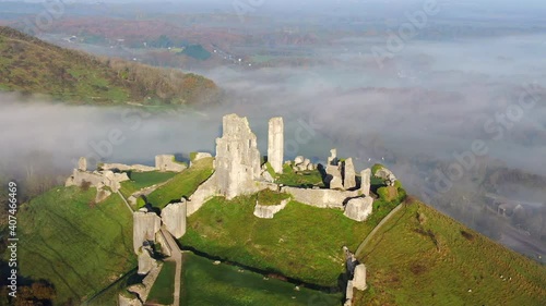 Aerial footage of Corfe Castle, Corfe, Isle of Purbeck, Dorset, England photo