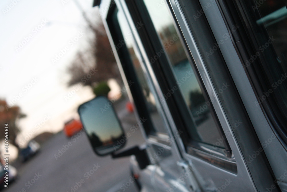 Blurred car and sunset sky view