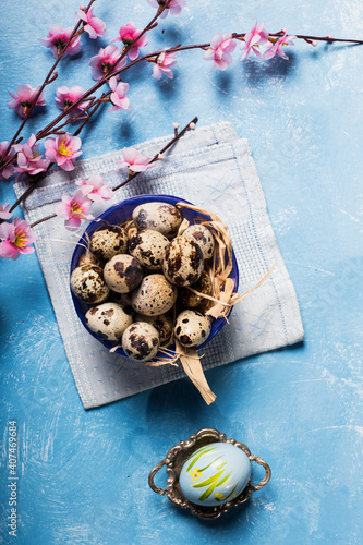 quail eggs inside nest in a easter background