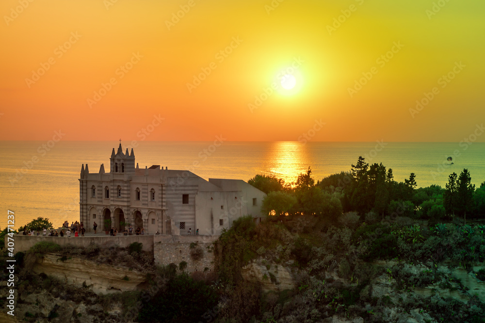 The Sanctuary of Santa Maria dell'Isola of Tropea at sunset, Calabria, Italy. Landmarks of Calabria, iconic church in Tropea.