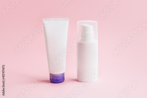 Two jars of face cream mockup for design isolated on pink background. Jar with Skin care bottles for gel, lotion, cream.