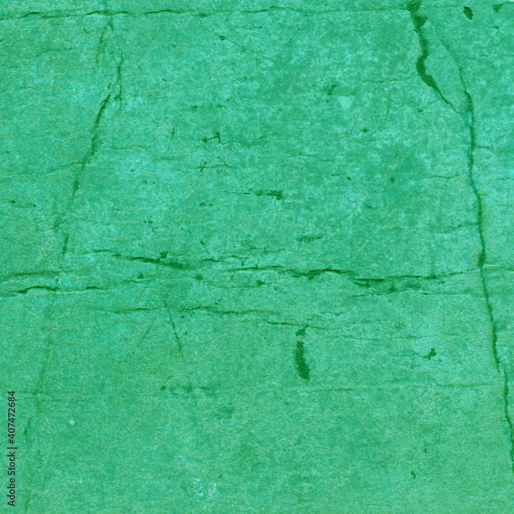 Cardboard green abstract pattern texture close-up. Retro old paper background. Grunge concrete wall. Vintage blank wallpaper.