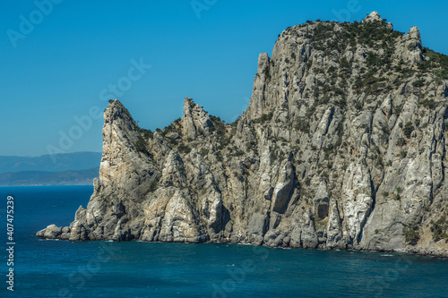  blue sea and high cliffs