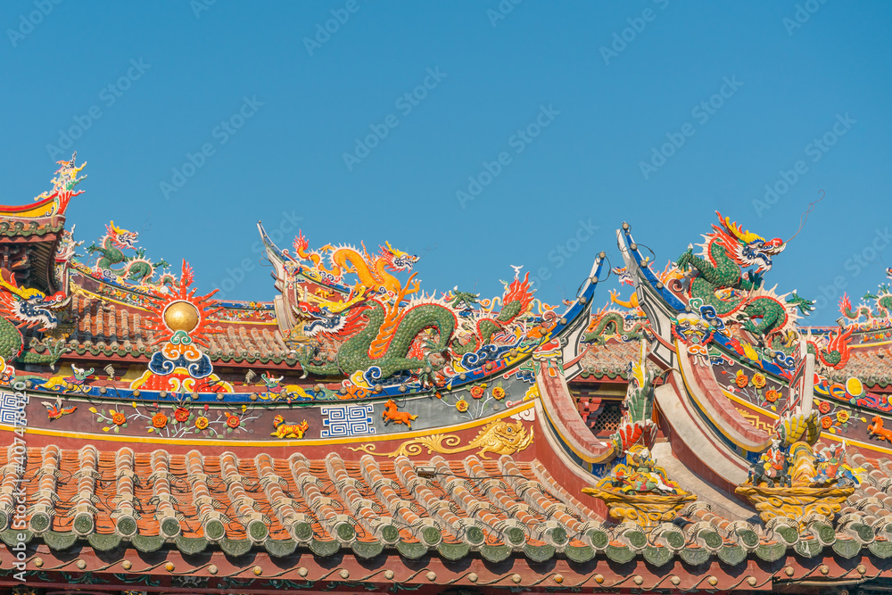 Fototapeta premium Sunset view of a wind turbine farm on top of mountain.