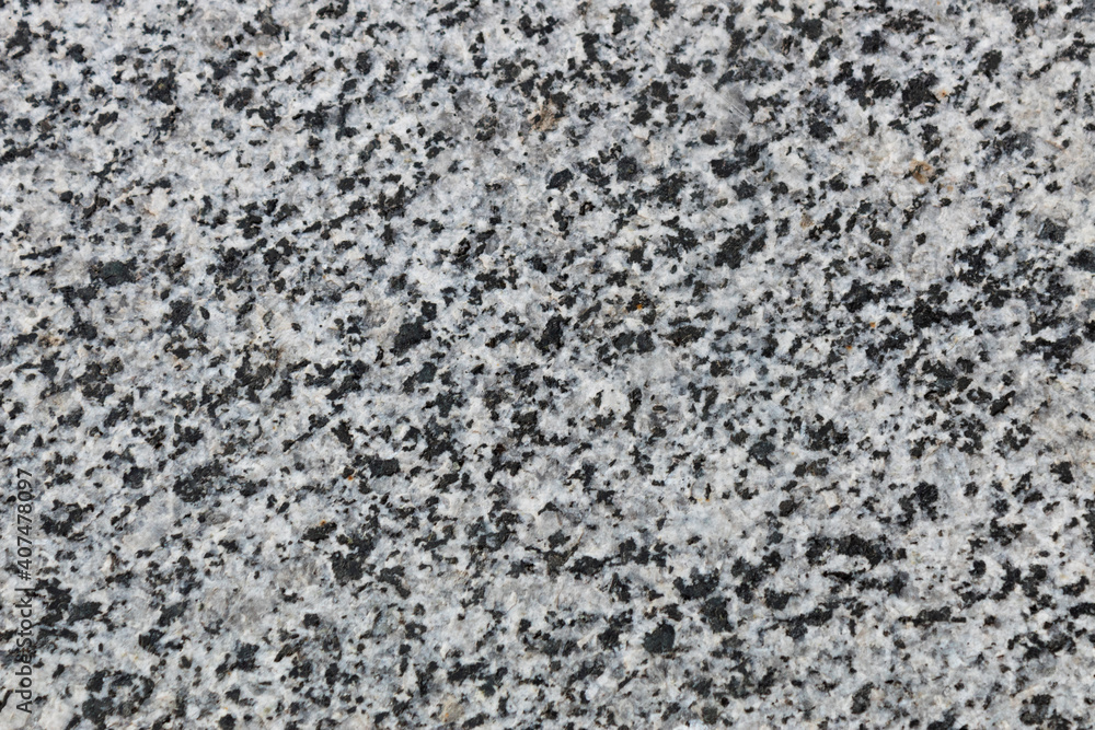 Natural grey granite with black spots. Natural grey granite with black spots.