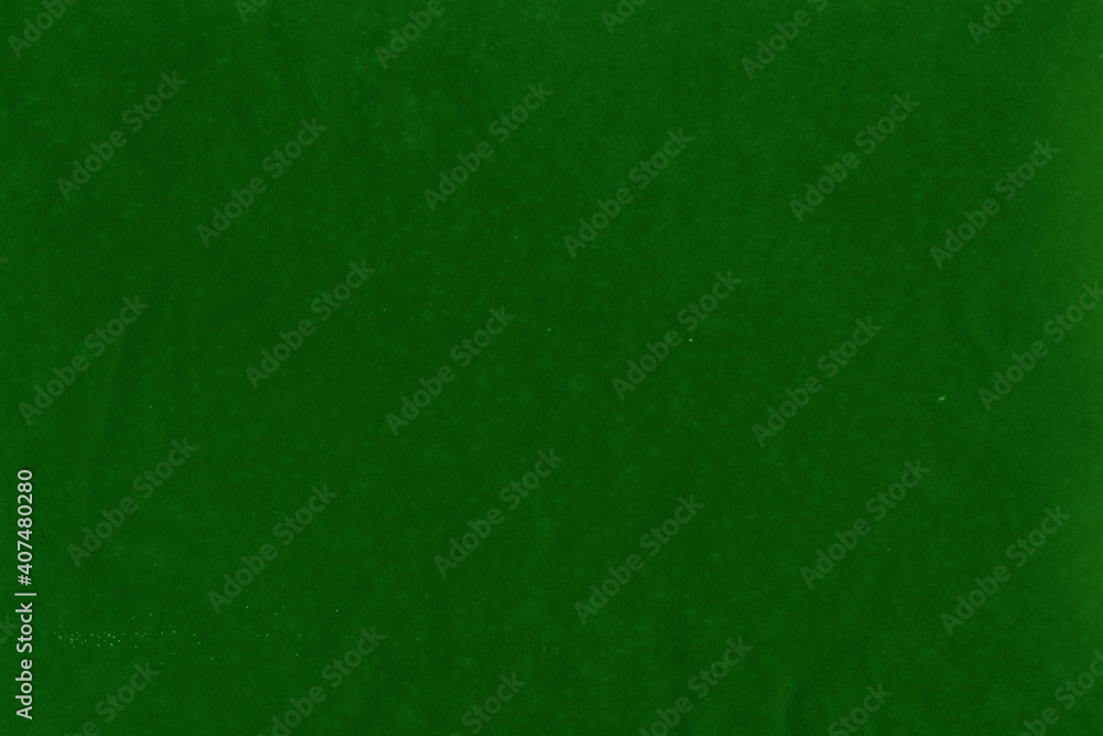 Cardboard green abstract pattern texture close-up. Retro old paper background. Grunge concrete wall. Vintage blank wallpaper. Cardboard green abstract pattern texture close-up. Retro old paper background. Grunge concrete wall. Vintage blank wallpaper.