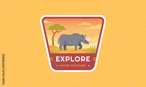 Outdoor wildlife adventure logo badge. Modern travel logo template best for emblem, patch, sticker, label, and many others. A rhinoceros living in a park flat vector illustration.