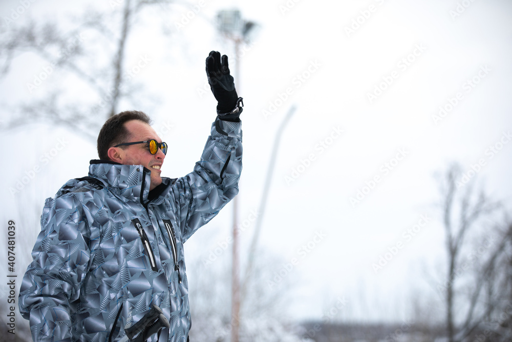 Man stands alone against winter background Man stands alone against winter background