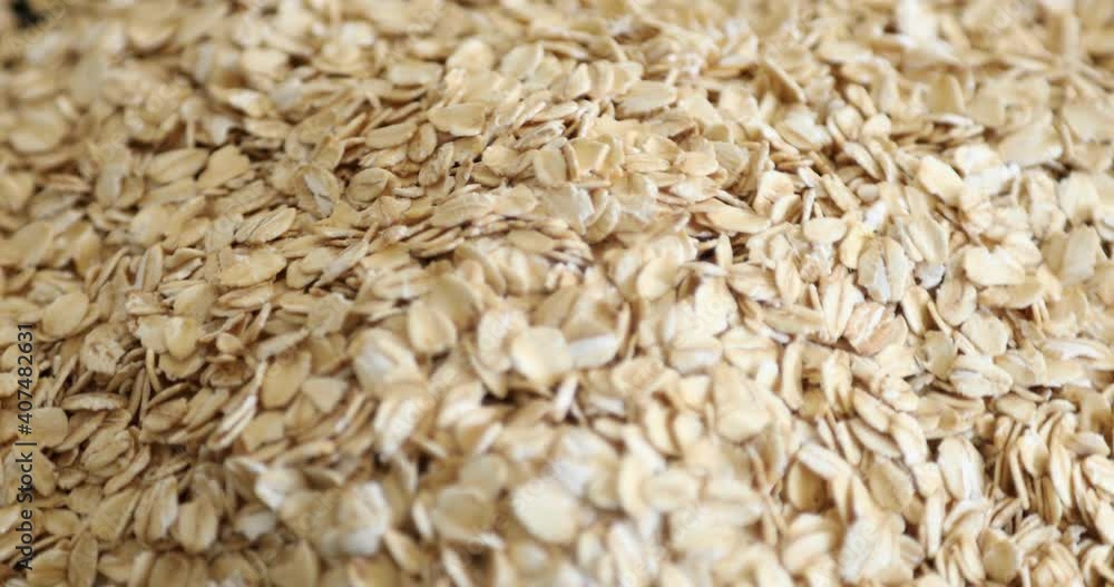 Top view of dry raw oat flakes Top view of dry raw oat flakes