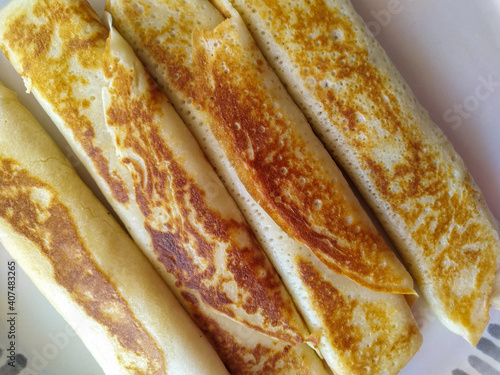 pancakes baked golden brown rolled and stuffed