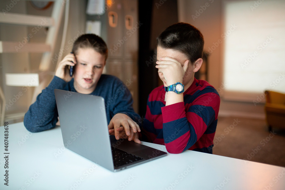 boy's eyes looking over the top of a laptop
boy's eyes looking over the top of a laptop