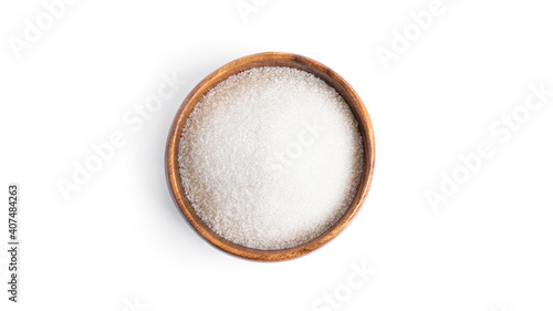 Sugar in a wooden bowl isolated on a white background.