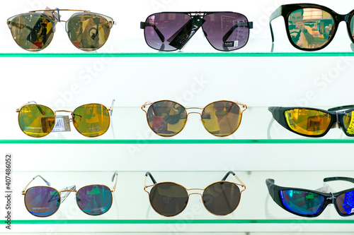 Designer sunglasses for sale in duty free store at airport © Roberto Sorin