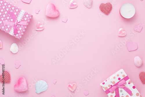 Gift box and pink heart on paper background with copy space for love wedding or valentines day © wirakorn