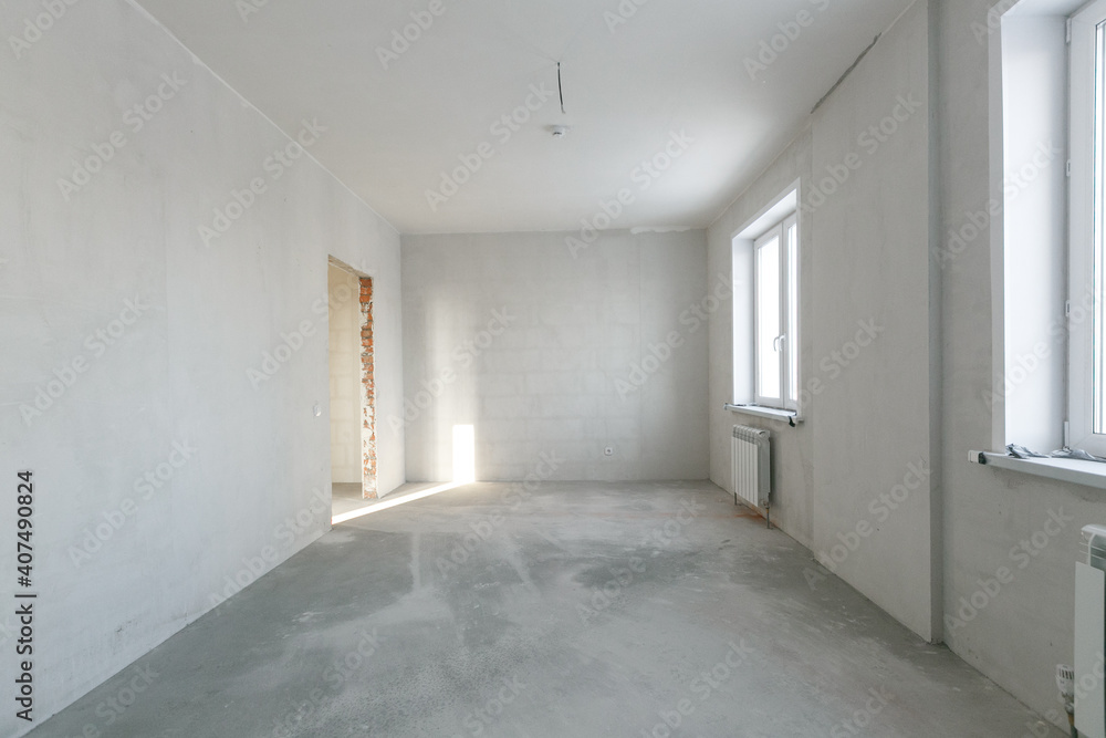 Obraz premium interior of the apartment without decoration in gray colors