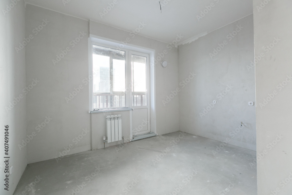 Obraz premium interior of the apartment without decoration in gray colors