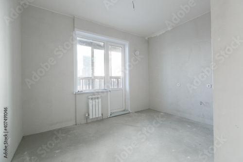 interior of the apartment without decoration in gray colors