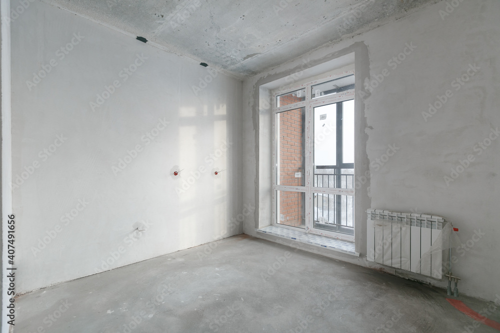 interior of the apartment without decoration in gray colors interior of the apartment without decoration in gray colors