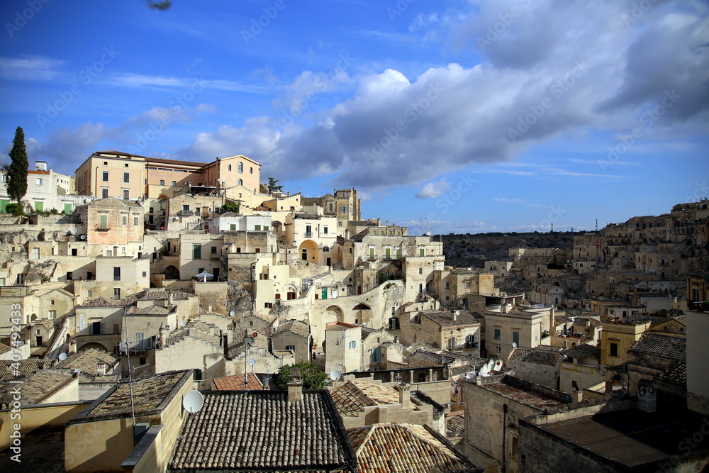 Panoramic view, under a blue sky, of the Sassi of Matera, European Capital of Culture 2019