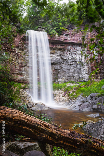 Long exposure of waterfall in summer woods