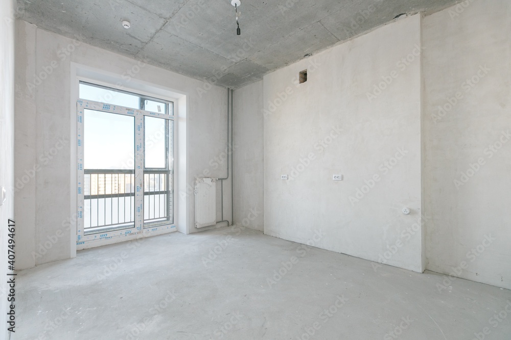 Obraz premium interior of the apartment without decoration in gray colors