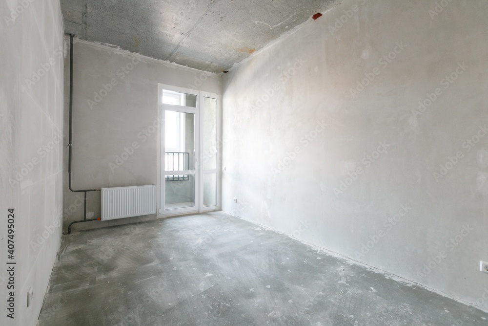 Obraz premium interior of the apartment without decoration in gray colors