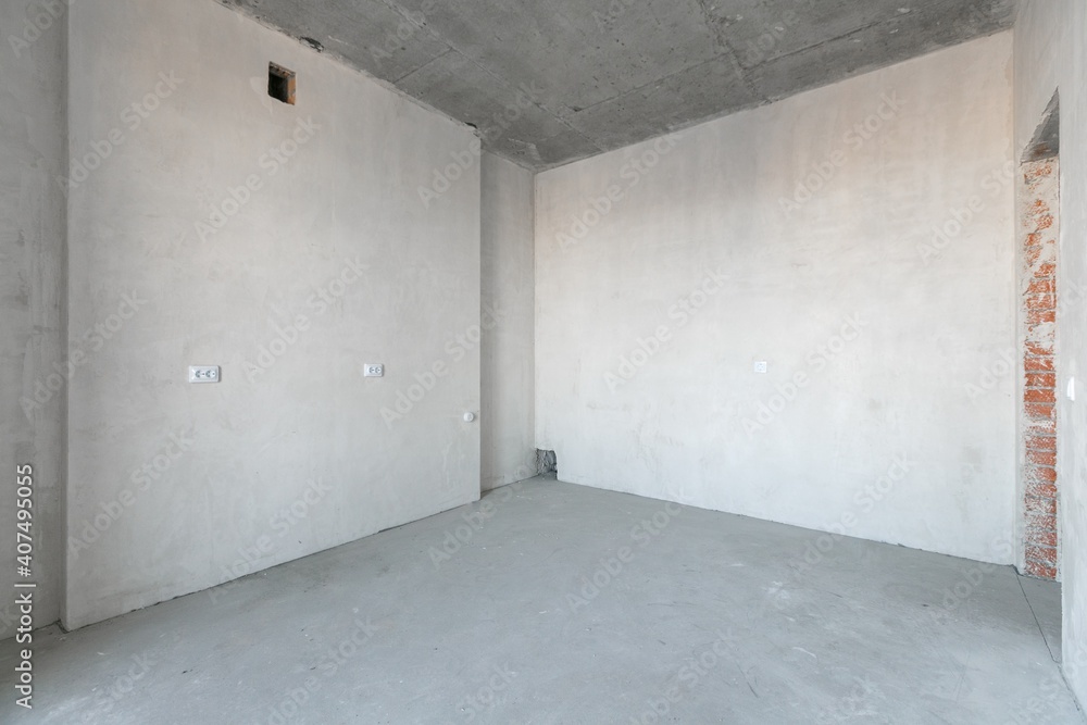 Obraz premium interior of the apartment without decoration in gray colors