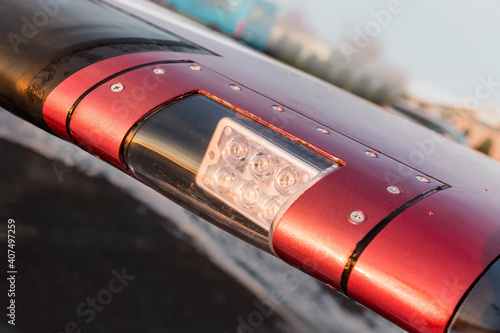 Front light on an airplane wing, close-up view of light. photo