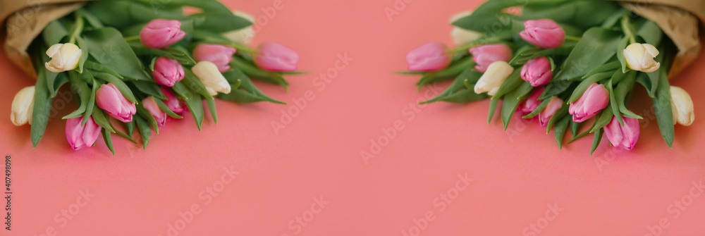 Banner for a Women s day, 8 march or Valentines day. Tulips on a pink background. Copy space for text. The concept of holidays and good morning wishes.