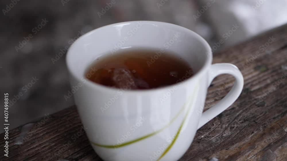 Sugar cube addiction to hot served tea slow motion Sugar cube addiction to hot served tea slow motion