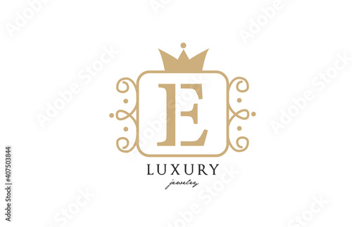 E simple yellow monogram alphabet letter logo. Creative icon design with king crown for luxury business and company