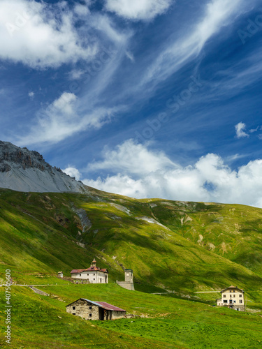 Iridescent cloud over the road to Stelvio pass (Lombardy) at summer