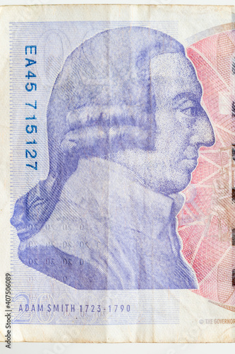 Portrait of Adam Smith on twenty pound sterling note.