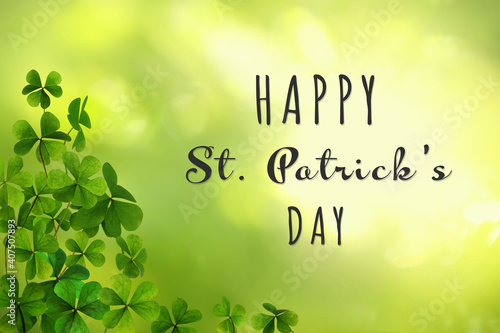 Happy St. Patrick's Day. Clover leaves on green background
