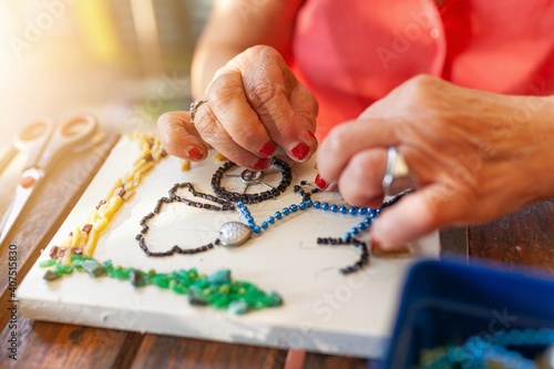 grandmother making crafts at home
