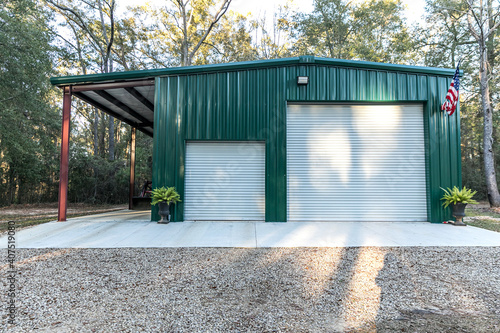 Large green outdoor metal building