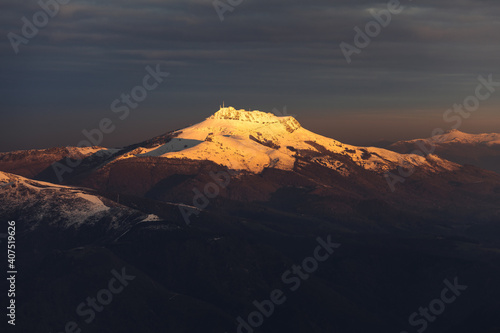 View of Larrun mountain covered by snow at a winter evening  Basque Country. © Jorge Argazkiak
