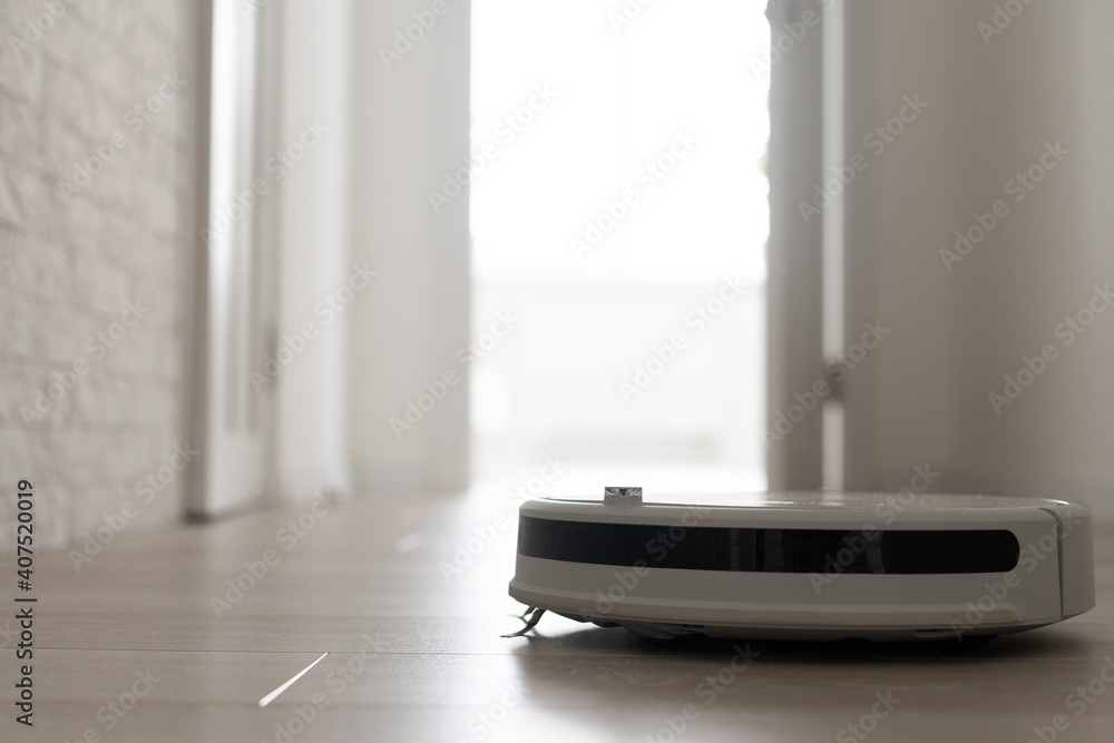 Robot Vacuum Cleaner In A Modern Living Room Robot Vacuum Cleaner In A Modern Living Room