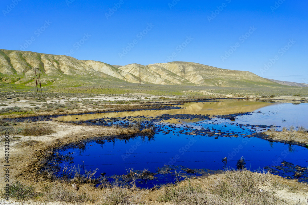 Azerbaidjan, near Gobustan, oil comes out  naturally from the ground