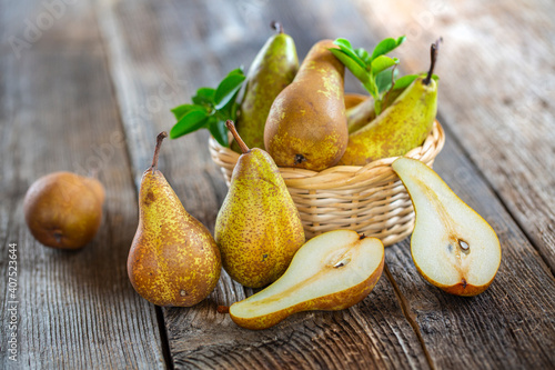 pears on rustic wooden background. autumn harvest with copy space photo