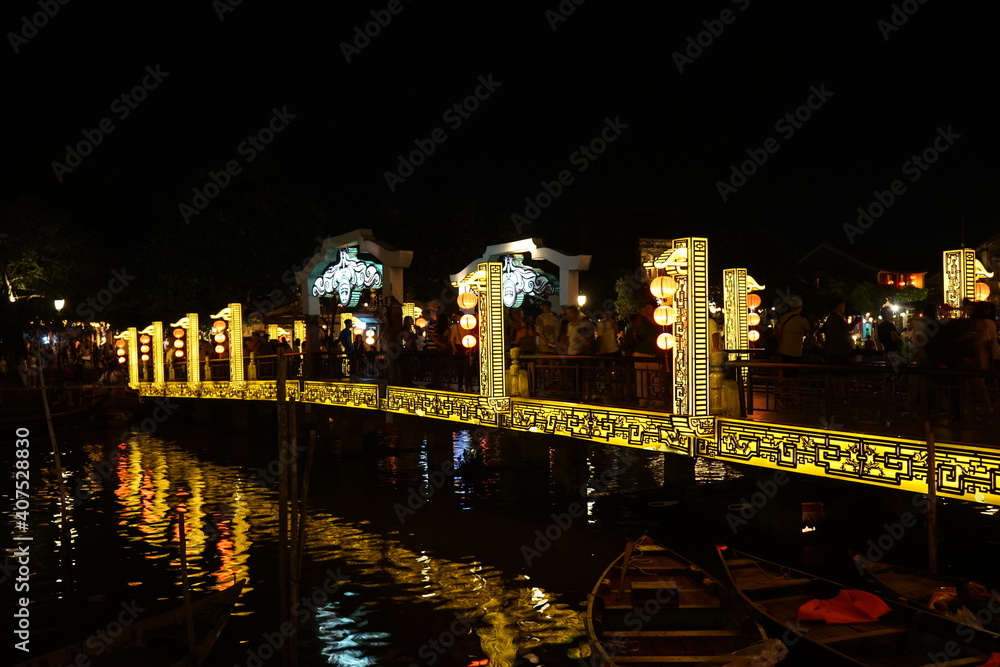 Night view of cloth lanterns lamp light shades hanging outside in Hoi An, Vietnam - ランタン 夜景 ホイアン ベトナム