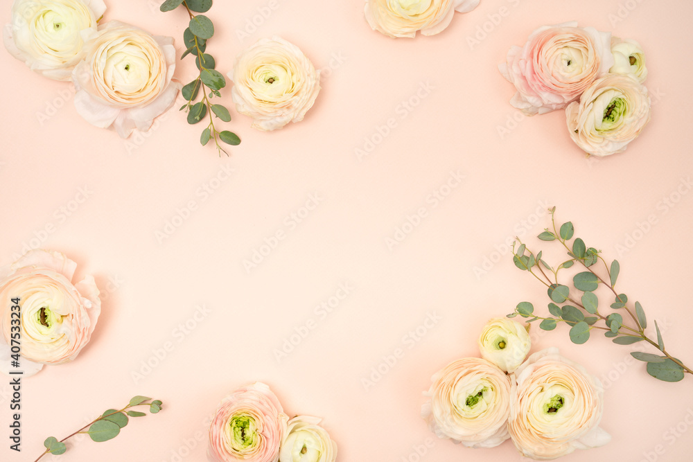 Blush floral background with ranunculus and copy space