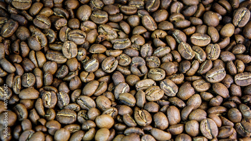 coffee beans. brown whole roasted fragrant delicious coffee beans. coffe pattern background