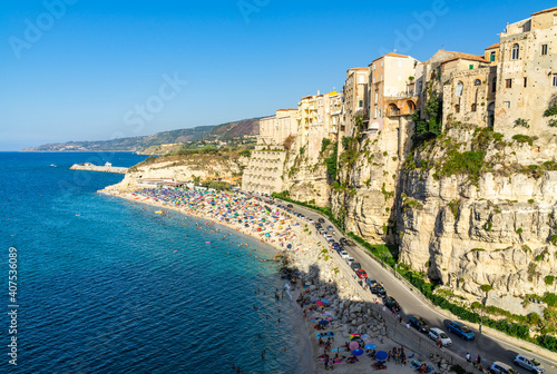 View of Tropea, a popular seaside resort town in Calabria region with old buildings built on the cliffs overlooking the sea, Italy