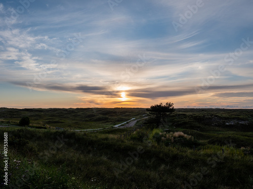 Sunset over the dunes on the island of Ameland. © Sven