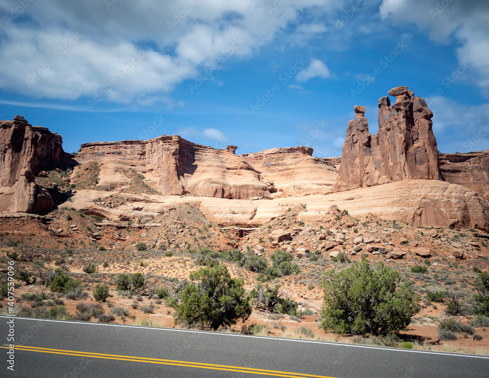 Dazzling Arches National Park in the summertime with sandstone formations on a partly cloudy day in Utah Dazzling Arches National Park in the summertime with sandstone formations on a partly cloudy day in Utah