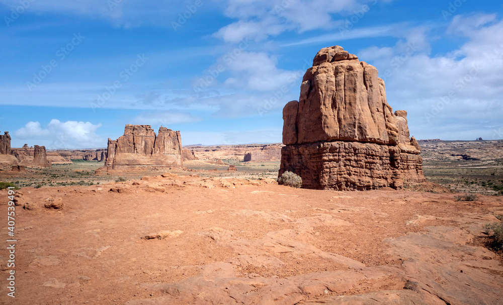 Dazzling Arches National Park in the summertime with sandstone formations on a partly cloudy day in Utah