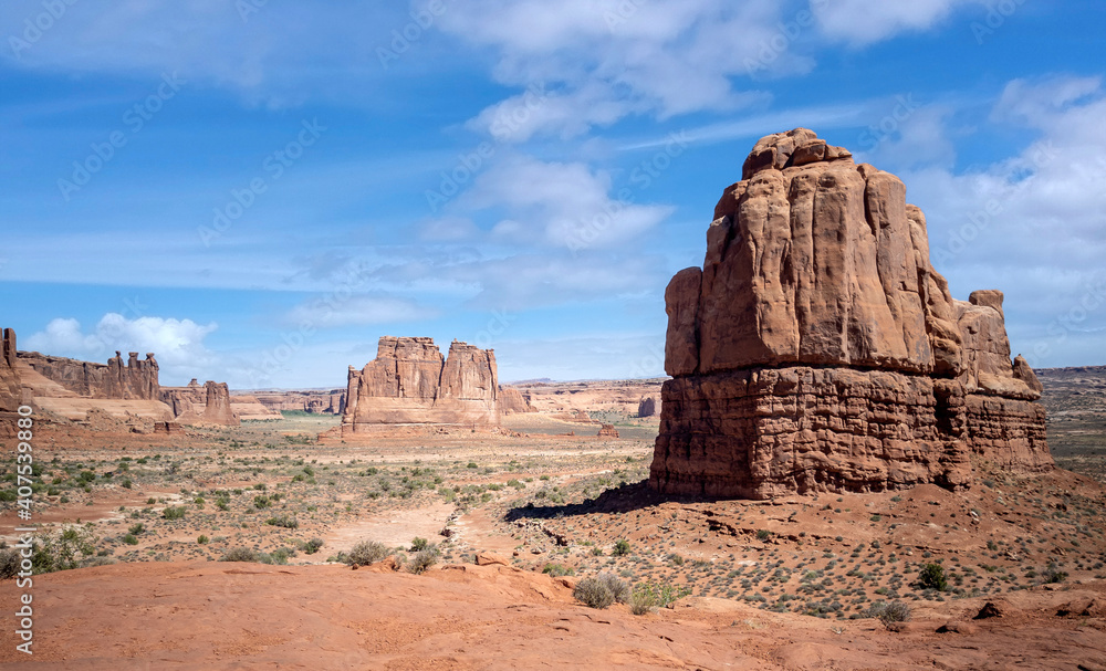 Dazzling Arches National Park in the summertime with sandstone formations on a partly cloudy day in Utah Dazzling Arches National Park in the summertime with sandstone formations on a partly cloudy day in Utah