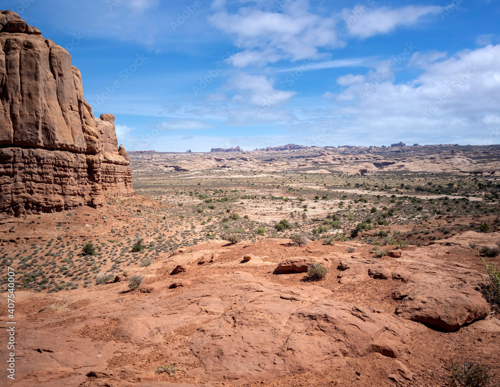 Dazzling Arches National Park in the summertime with sandstone formations on a partly cloudy day in Utah Dazzling Arches National Park in the summertime with sandstone formations on a partly cloudy day in Utah